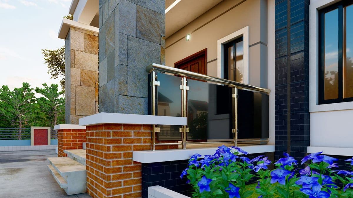 Contemporary house entrance with stone cladding and a glass balustrade
